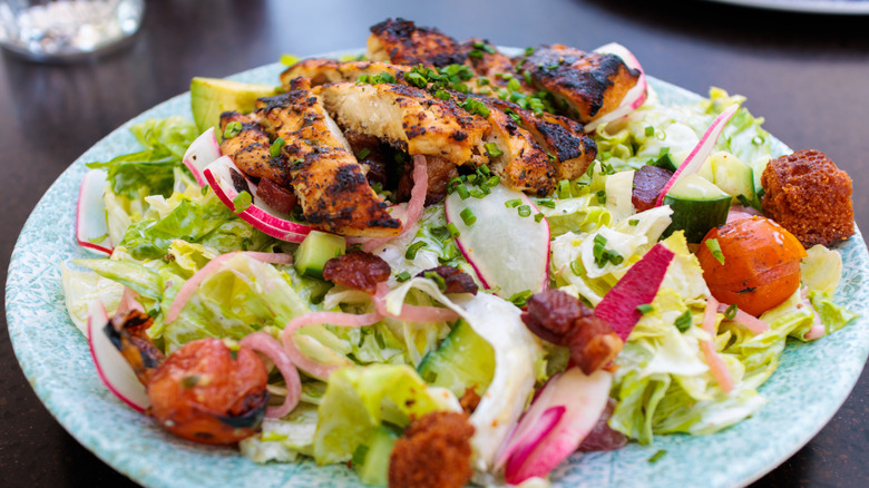 Grilled chicken salad with iceberg lettuce