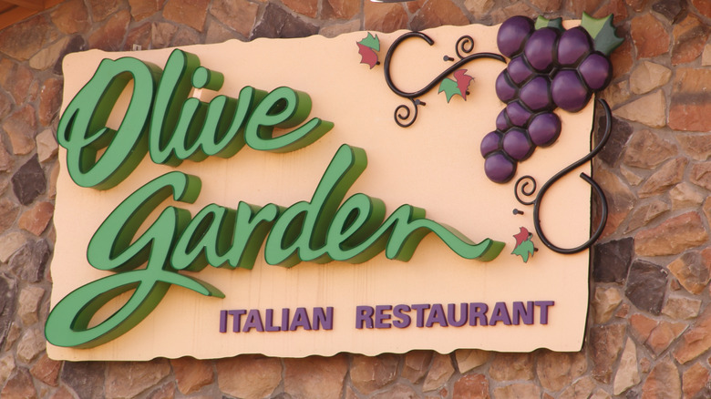 An Olive Garden Italian Restaurant sign on the outside of an Olive Garden restaurant.