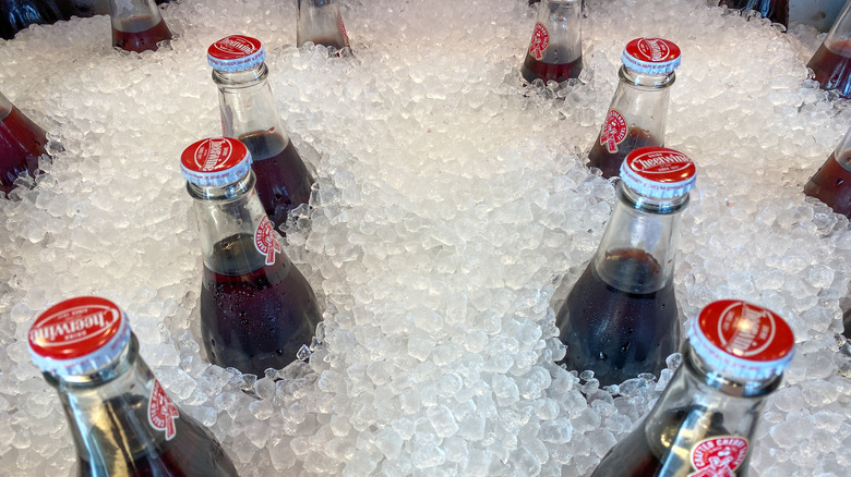 Ice cold bottles of cherry soda Cheerwine