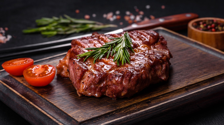 Grilled steak on a wooden board