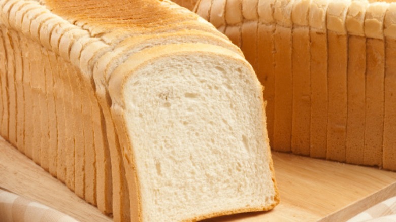 A sliced loaf of white bread