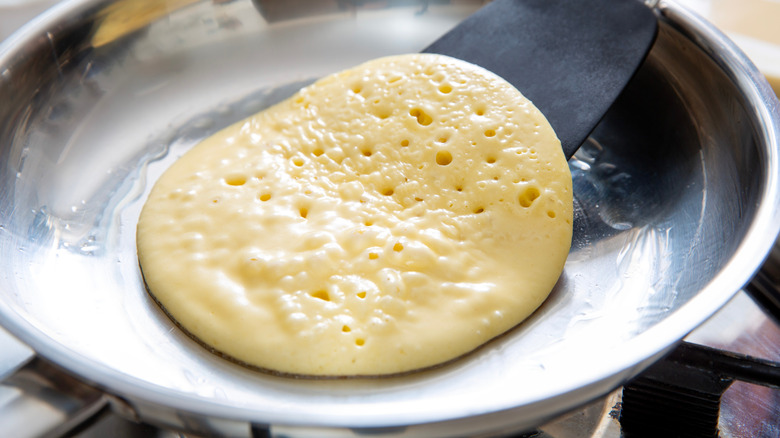 Flipping pancake with spatula