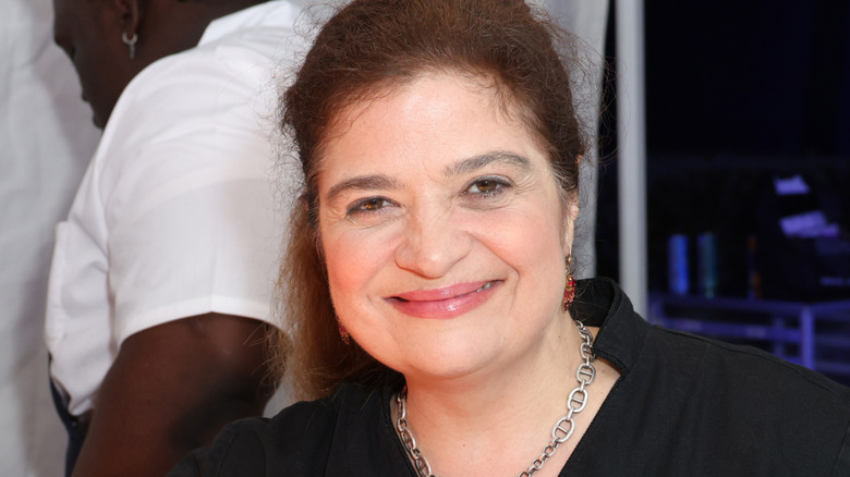 Alex Guarnaschelli smiling tight lipped