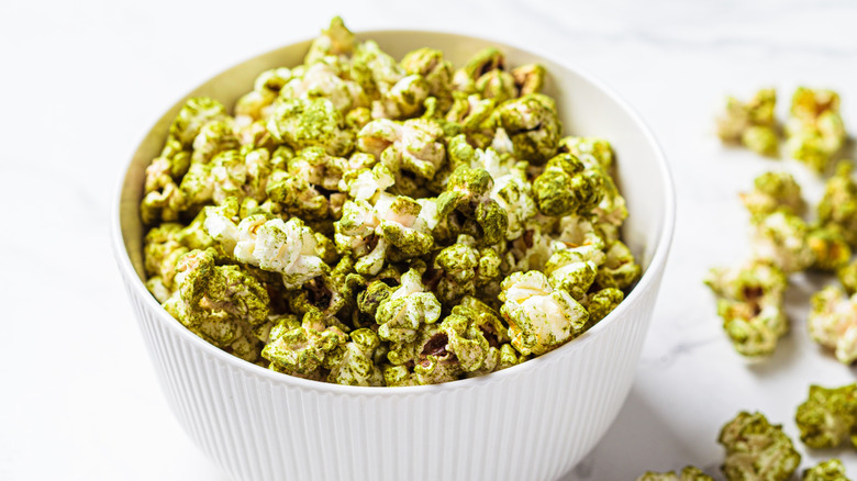 A bowl of popcorn dusted in green tea matcha powder