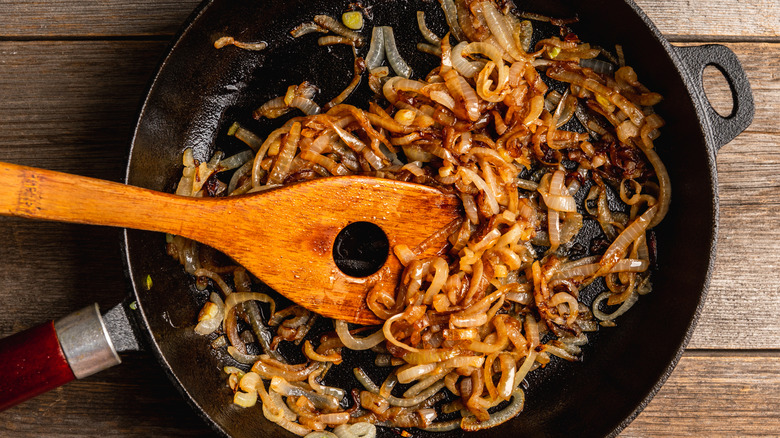 Caramelized onions and spices cooking in a pan