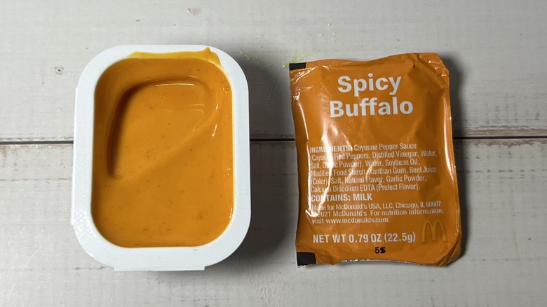 Open container of McDonald's Spicy Buffalo Sauce