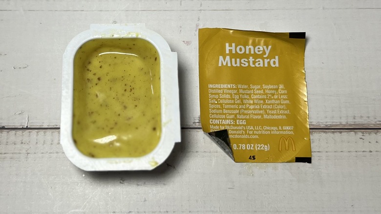 Open container of McDonald's Honey Mustard Sauce