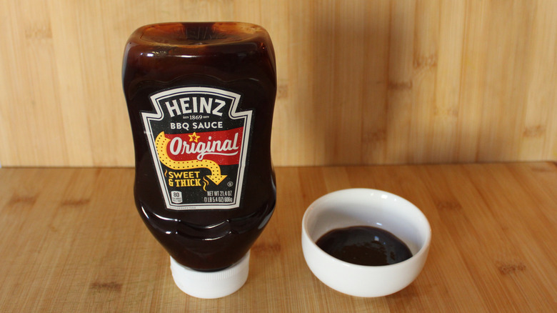 Container and bowl of Heinz Original BBQ Sauce