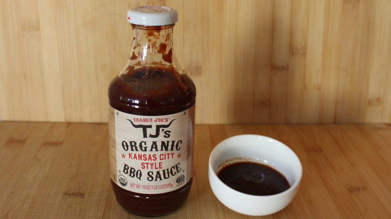 Bottle and bowl of Trader Joe's Kansas City style barbecue sauce