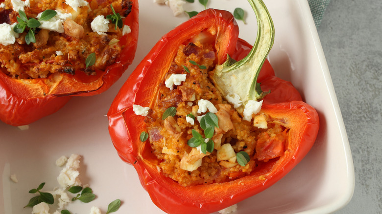 Stuffed bell peppers topped with feta cheese