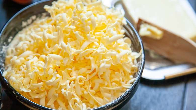 Close up of bowl with grated butter