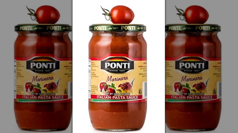 Ponti Marinara Sauce jar with cherry tomato on top