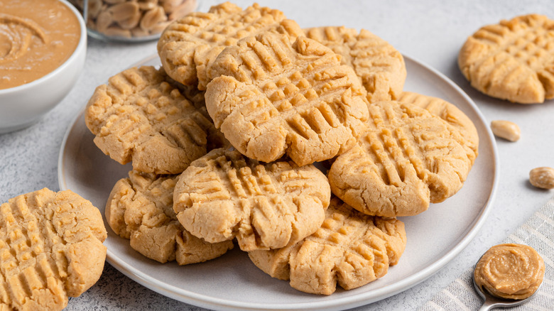 Peanut butter cookies on a white plate.