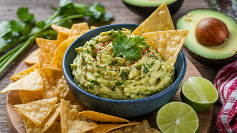 Guacamole with cilantro, lime, and tortilla chips