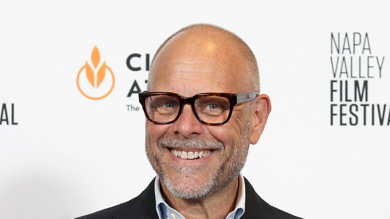 Alton brown smiling on film festival red carpet