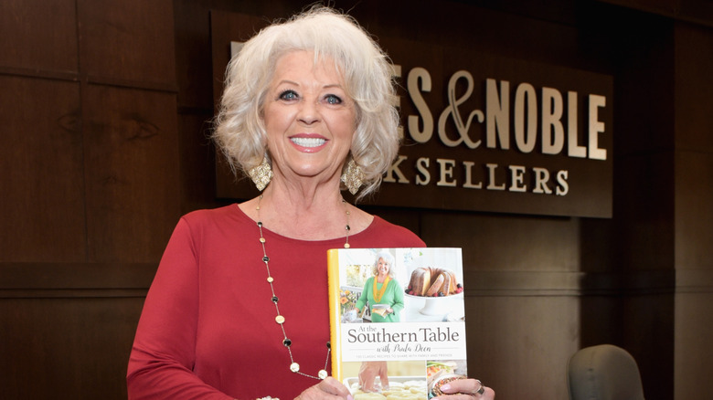 Paula Deen holding book