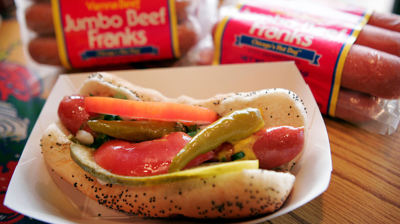 chicago style hot dog in paper boat