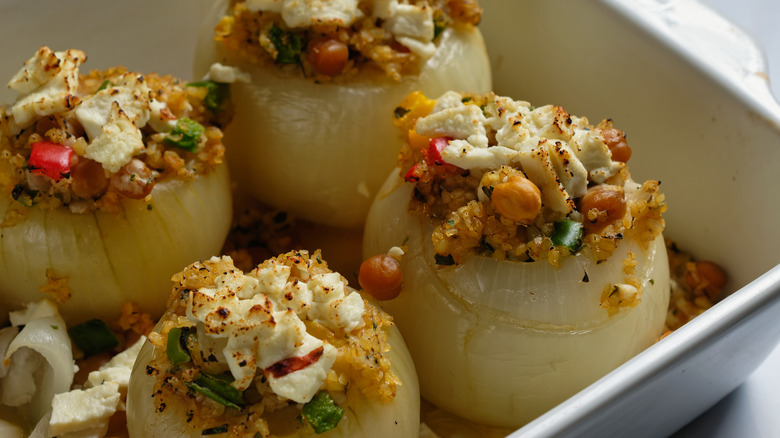 Stuffed onions in baking dish