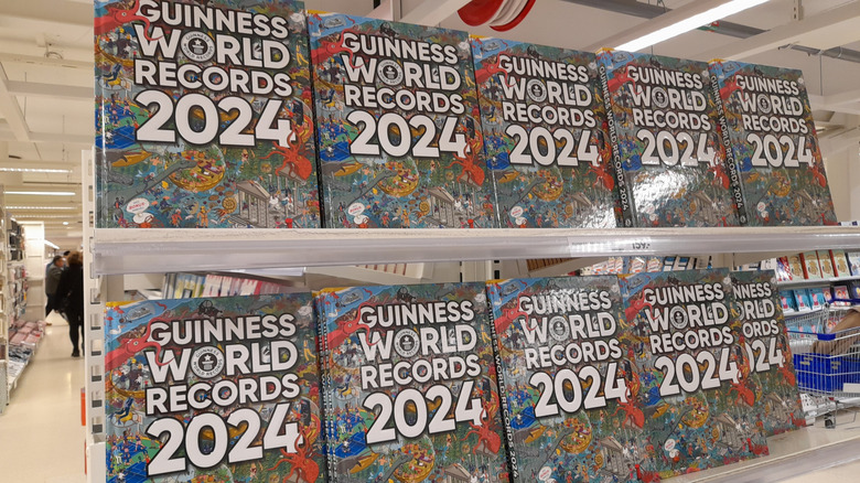 Copies of the Guinness World Records anthology 2024 on store shelves