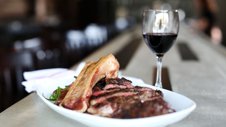 Steak and wine at a restaurant