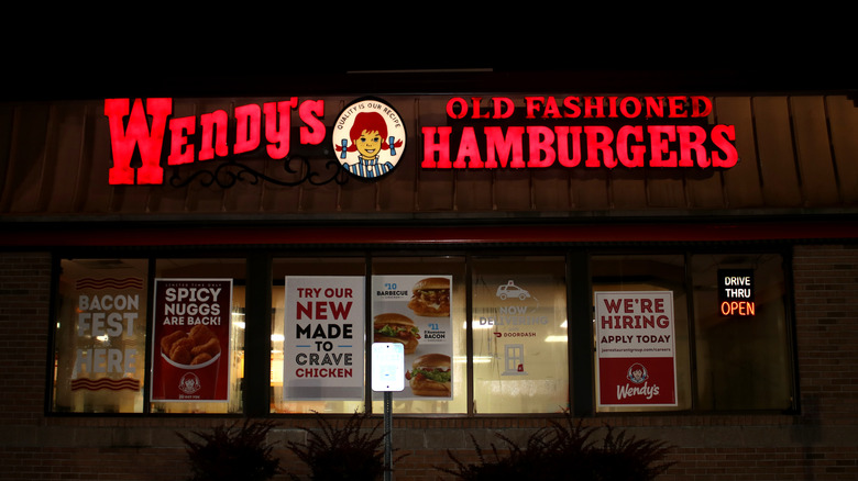 Exterior of a Wendy's restaurant at night