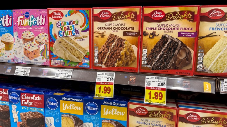 An aisle of cake mixes at the supermarket