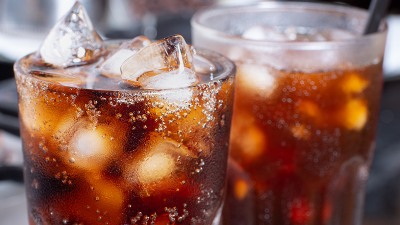 cups with soda and ice