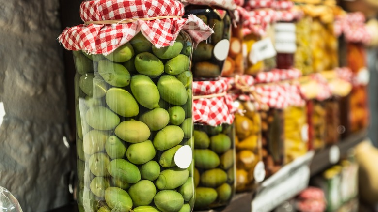 Jars of brined olives