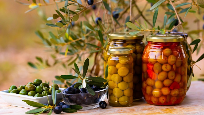 Jars of cured olives