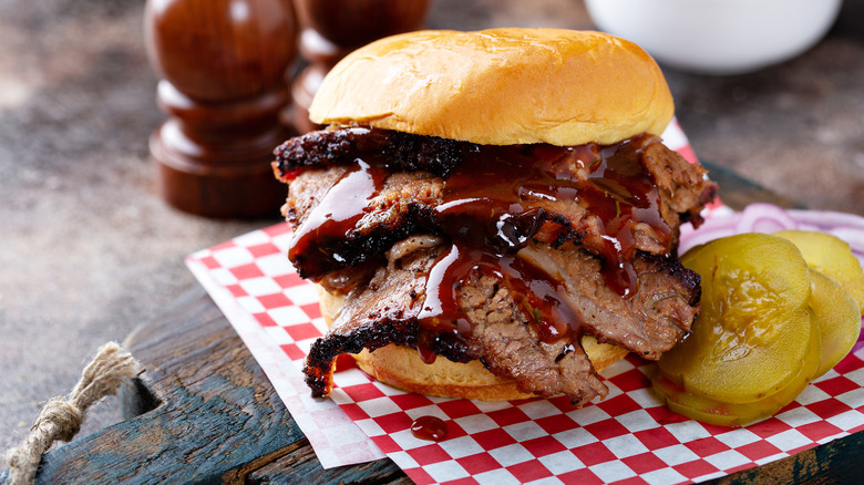 Pickles served with a brisket sandwich