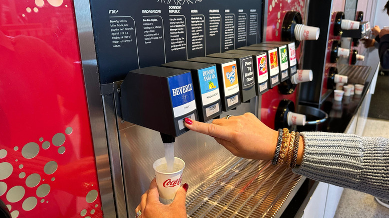 dispensing Beverly drink into cup