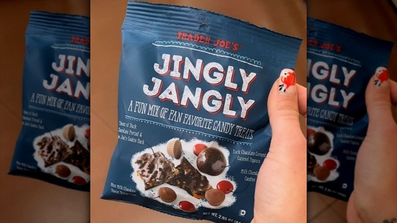 hand holding bag of Trader Joe's Jingly Jangly