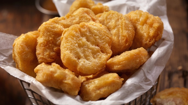 Basket of breaded chicken nuggets.