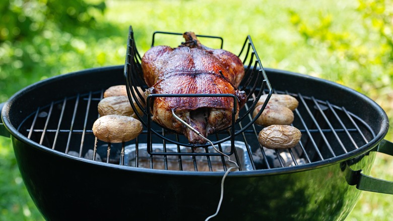 chicken on smoky grill