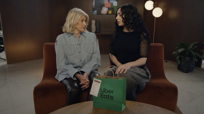 Charli XCX and Martha Stewart sit together in the new Uber Eats ad