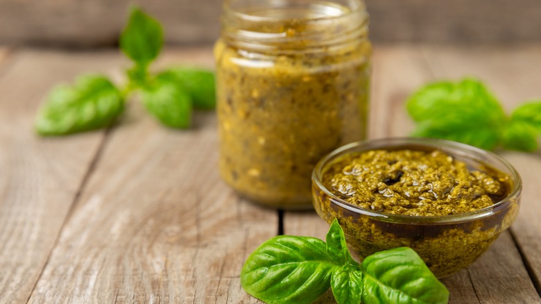 Jar and bowl of pesto