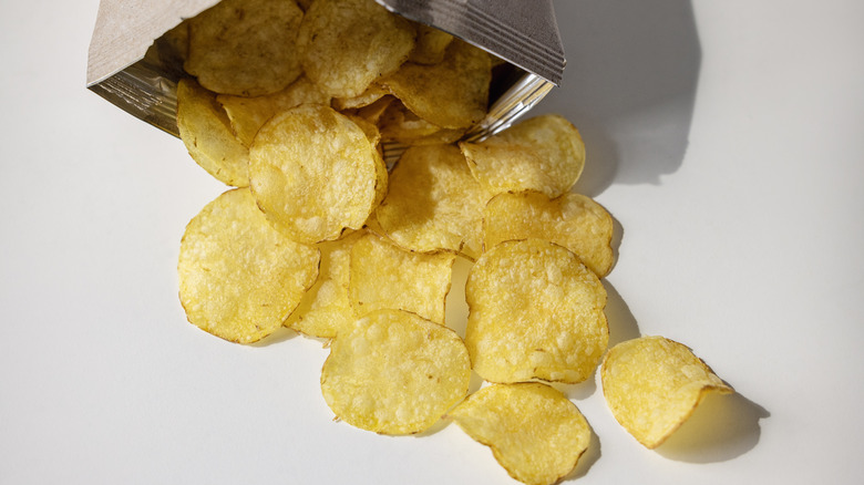 Potato chips spilling from bag