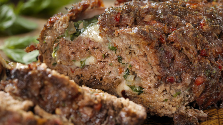 Sliced meatloaf filled with mozzarella and herbs