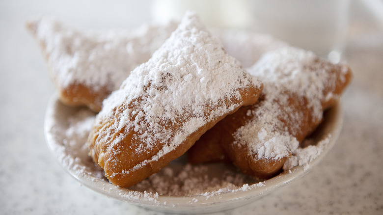 crescent roll beignets in a bowl