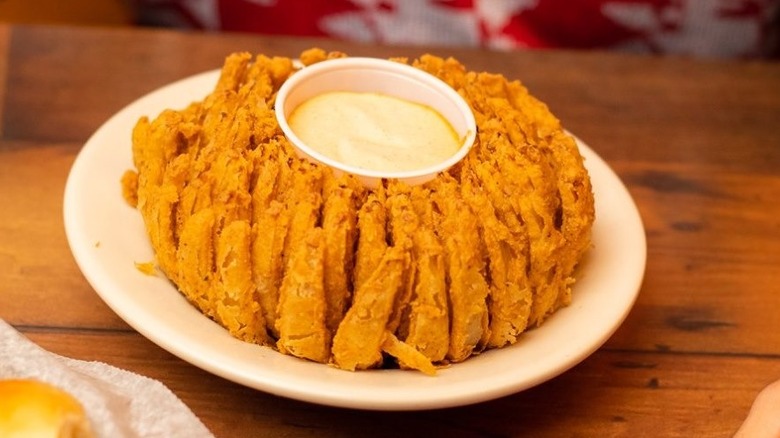 Cactus blossom and cajun sauce served at a Texas Roadhouse.