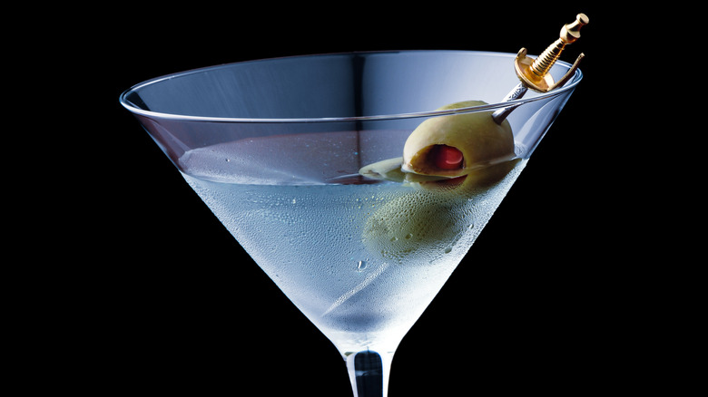 A dirty martini with olives