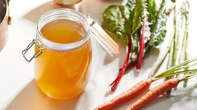 broth in jar with veggies