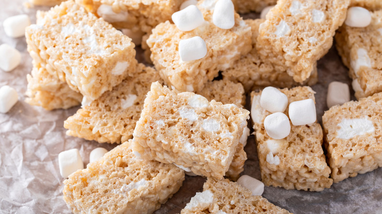 Stack of Rice Krispy treats with marshmallows on top