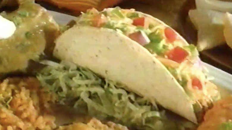 old commercial video showing taco on platter