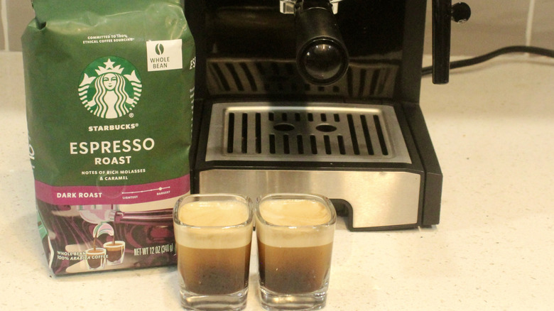 Two espresso shots with Starbucks coffee bag