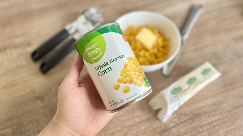 Handheld can of Amazon Fresh corn