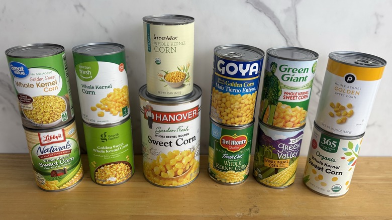 Cans of corn stacked on counter