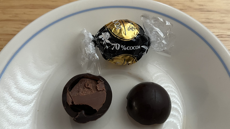 Lindt Lindor 70% Extra Dark Chocolate truffles on plate