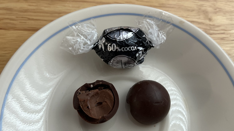 Lindt Lindor 60% Extra Dark Chocolate truffles on plate