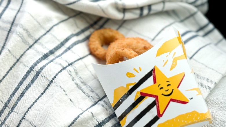 Carl's Jr. onion rings in paper container